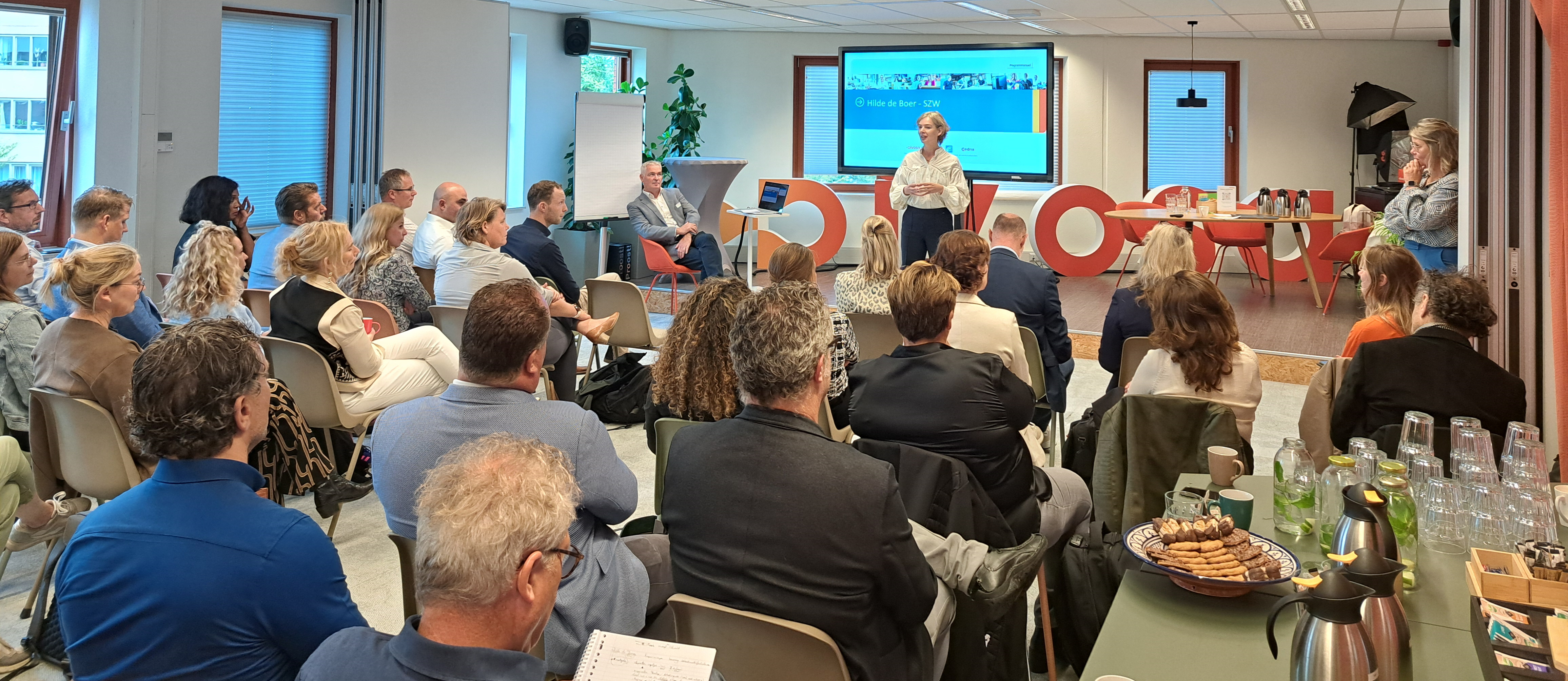 Spreker Hilde de Boer (SZW) op de bijeenkomst van 24 september 2024